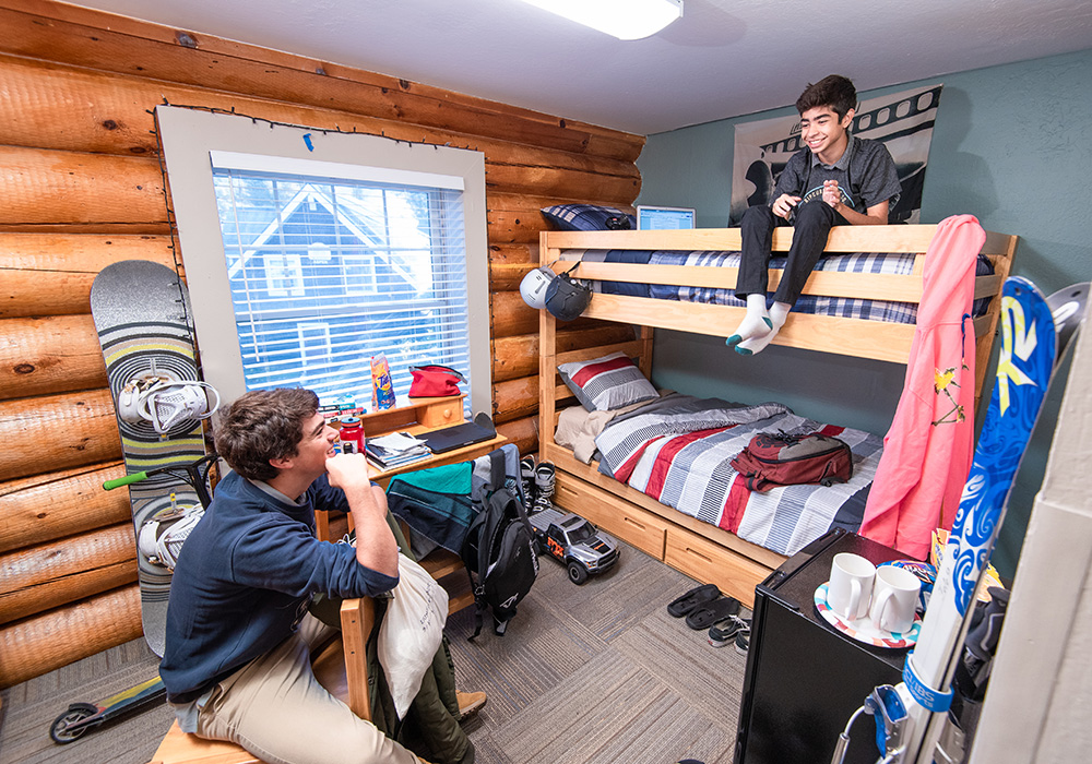 male students in dorm room