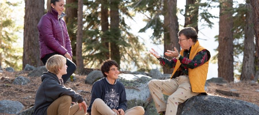 Head of School with students outdoors